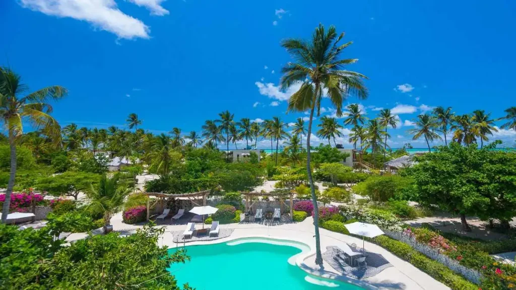 luxury beach resort with tropical ocean and white sand beach