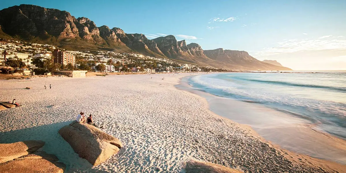 Sunny summer view of Camps Bay beach and Table Mountain in Cape Town South Africa