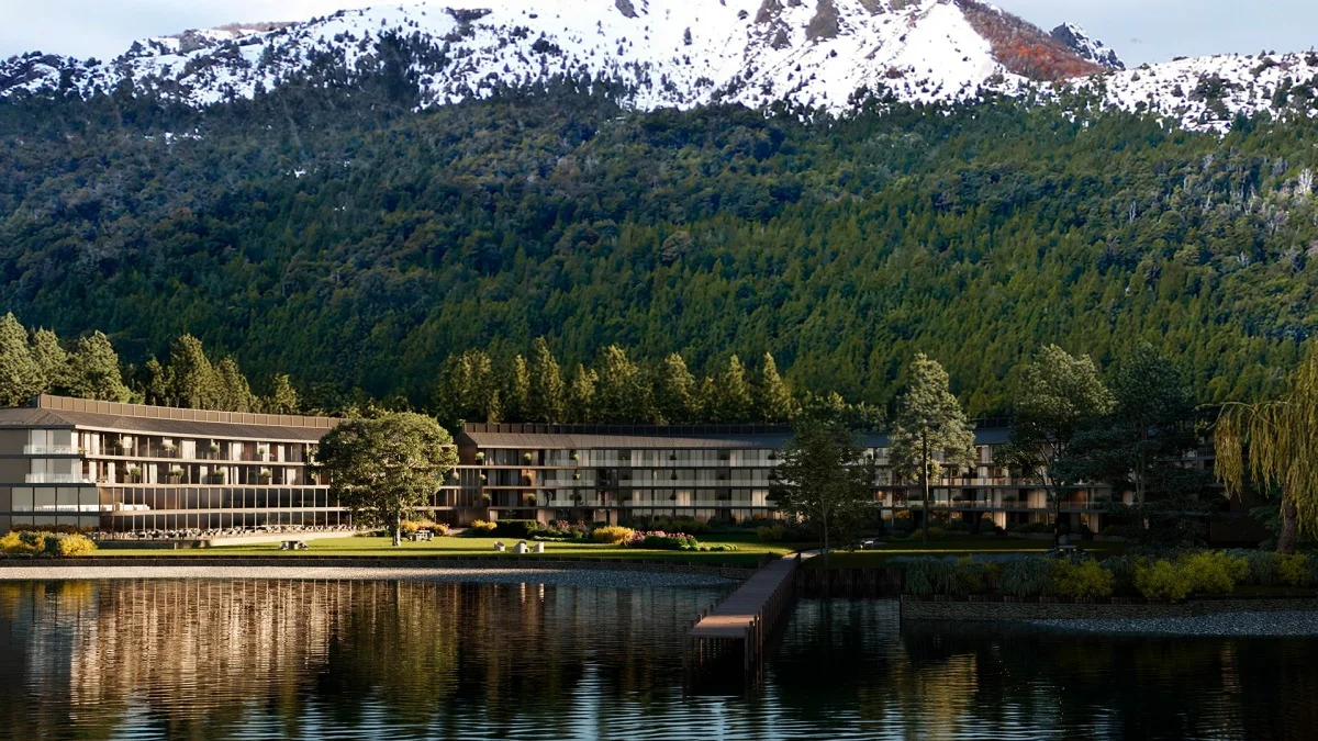 Dramatic modern lodge situated on the shores of Lake Pehoé facing the granite peaks of Torres del Paine in Chile.