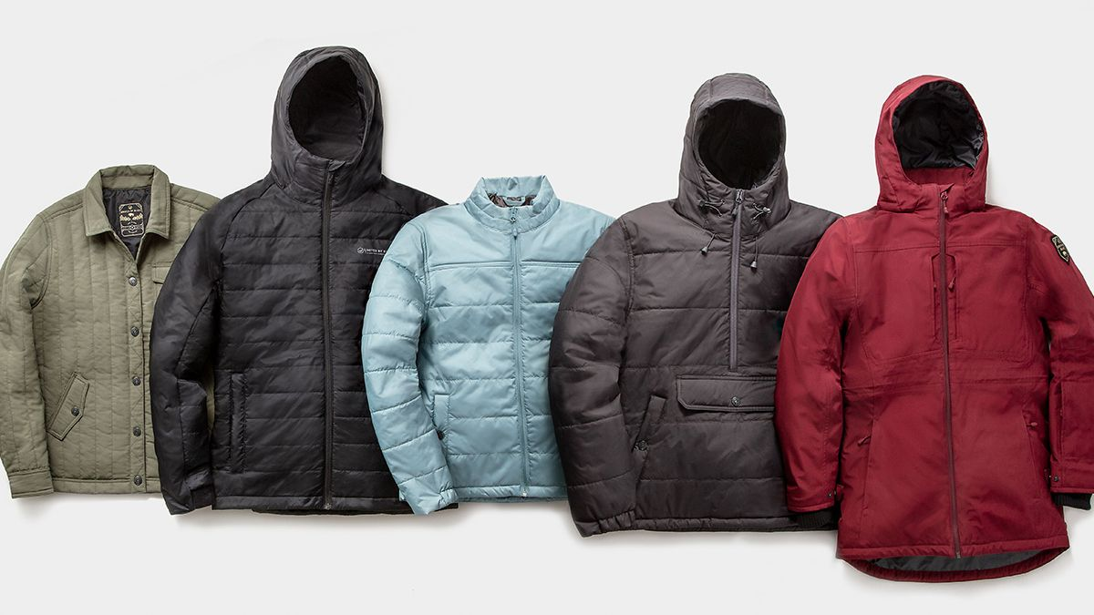 Assortment of colorful winter jackets and coats