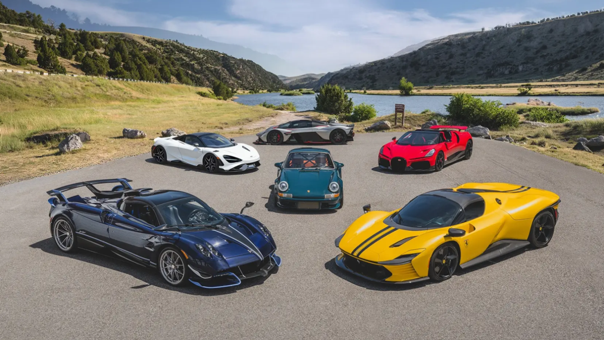 Yellow Lamborghini Revuelto supercar parked on an asphalt track facing forward