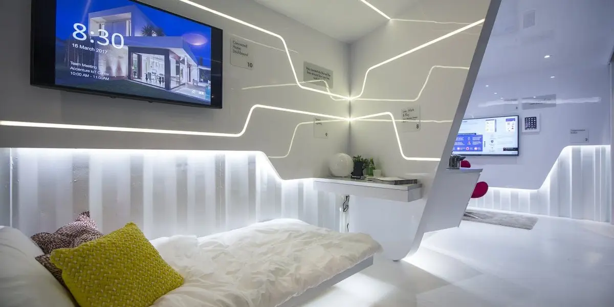 A modern smart home living room featuring integrated automation screens and high-tech entertainment systems