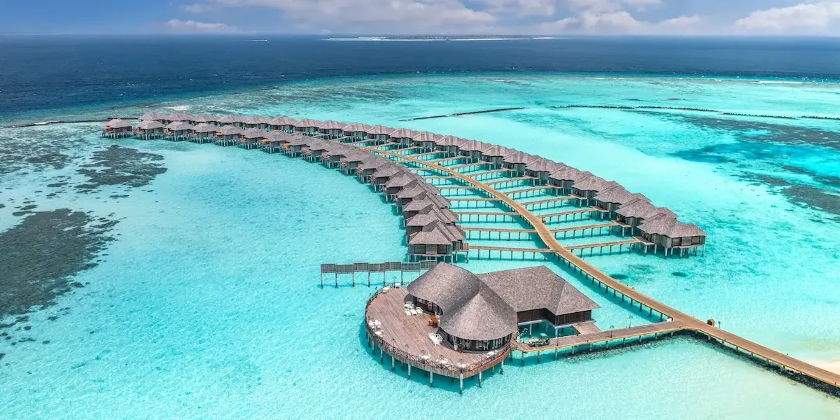 Maldives overwater villas and turquoise lagoon