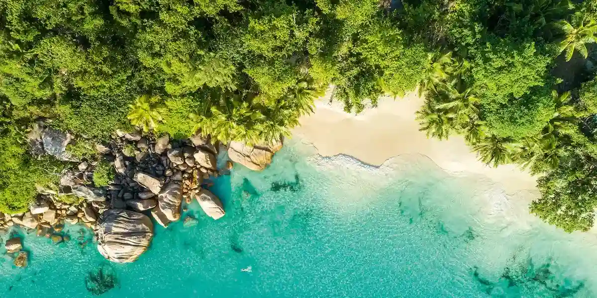 Seychelles granite beach with turquoise water