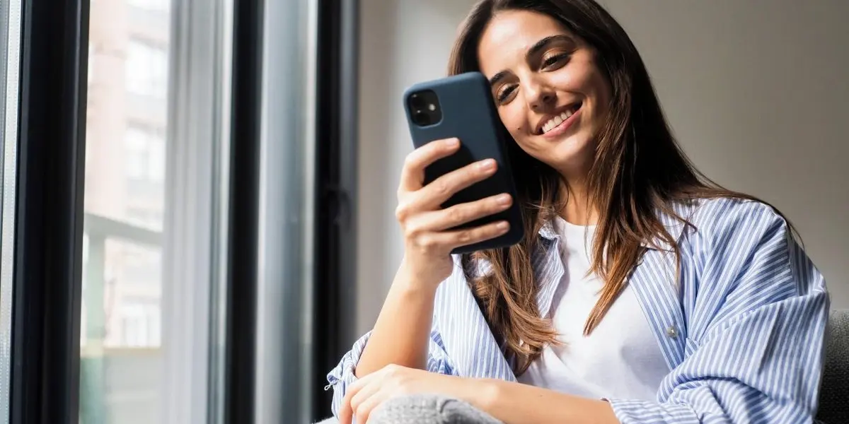 A smartphone showing an Aritzia email notification